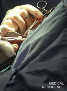 A person holding some scissors in their hand.