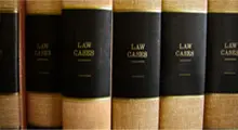 A row of law books sitting on top of each other.